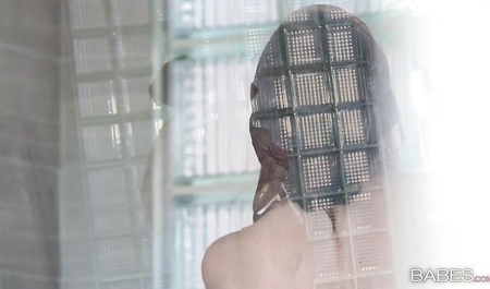 Beautiful girl skillfully Masturbates in the shower