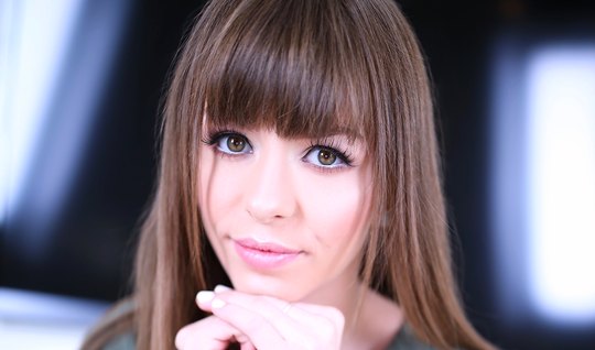 Brunette on her knees doing porn closeup