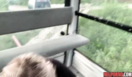 Girl during a trip jerks off a mans penis at the camera and opens her mouth for a Blowjob