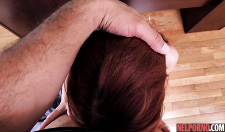 Redhead teacher makes a Blowjob to the black man right in his office