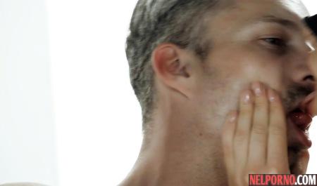 Blonde in mask and stockings dominates a gray-haired man