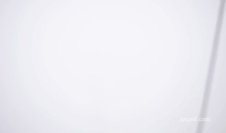 Chick with his hands tied sits on a member of the sports guy