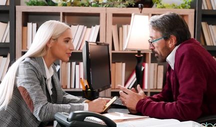 Blonde in the office spreads legs and inserts hairy hole of love