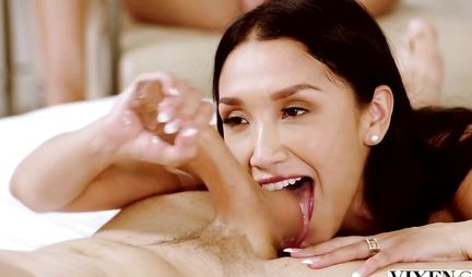 The wife looks at her husbands infidelity with a young brunette in their bedroom