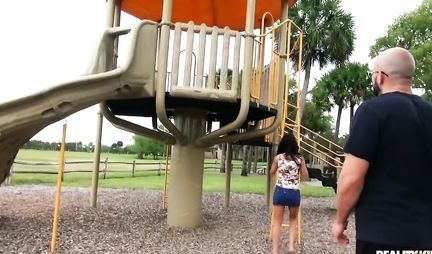 The brunette lifted her legs up and moaning from the flogging with the bald guy