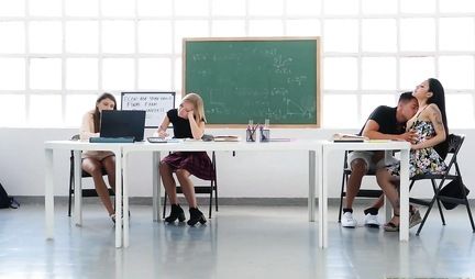 The teacher in front of the students fucks with an Asian girl in a short dress right on the table