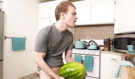 A young boy jerked off his penis with a watermelon, and then fucked a nice neighbor in the kitchen