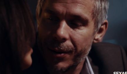 A strong man undresses a busty brunette and has a hairy slit for a long time