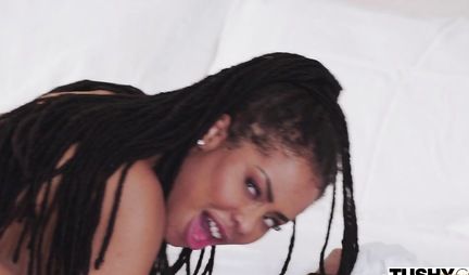 The mulatto wet her ass with oil and prepared to give anal to a white man