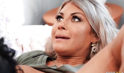 Lesbians were caught by a soccer player and fucked in a spacious bed in caps