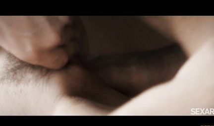 Tattooed soldier gently shoves a stone phallus into the slim vagina and makes her cum