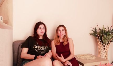 Lesbian on all fours shoves a long strapon into an attractive redhead