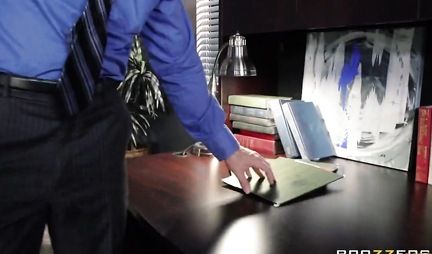 A bald dude in the office fucks a brunette with big tits