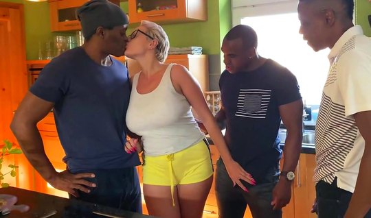 A black man with a long bolt and his friend gave a mature...