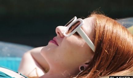 A Negro with a big and thick penis fucks a redhead girl and brings to orgasm