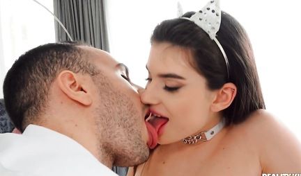 A brunette in a pose of cancer enjoys gentle sex with her lover