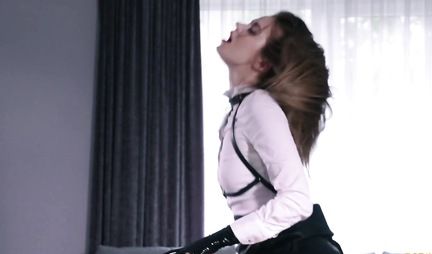 Strapon lesbians entertain each other in the living room and cum with pleasure