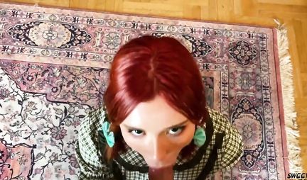 Redhead young beauty on the couch substitutes a tight hole for homemade porn