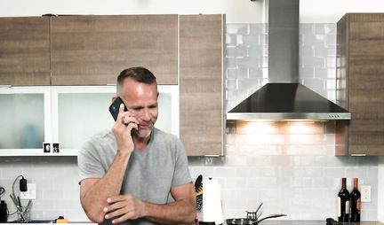 Man in the kitchen fucks tattooed blonde with big tits