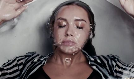 Russian chick right on the bed gives a hot POV blowjob