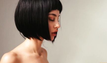 Lesbians caress their caps with their fingers and fuck each other with a thick strap-on