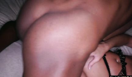 A brunette fucks with a black man in a hotel room and sucks his big dick