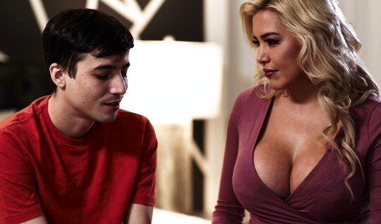 A young guy passionately fucks a blonde with big tits