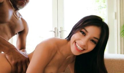 Cute brunette picked up a black man with a big dick while relaxing