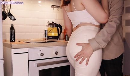 Russian girl with a tattoo sucks a guys strong penis in the morning in the kitchen