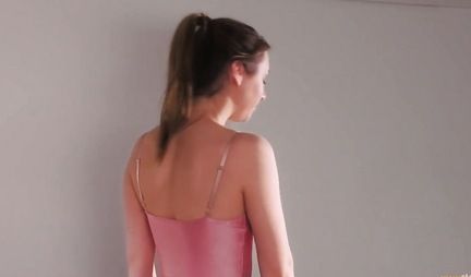 Two passionate lesbians beautifully fuck with a strap-on in bed