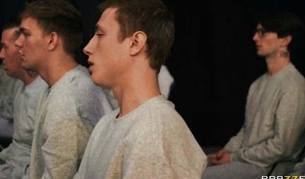 A girl with big tits gives a blowjob to all the guys in a row