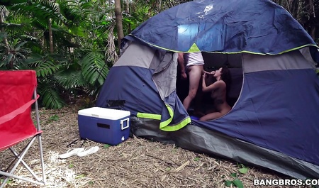 Cute brunette in the morning seduces guy to have sex in a tent on the camping trip