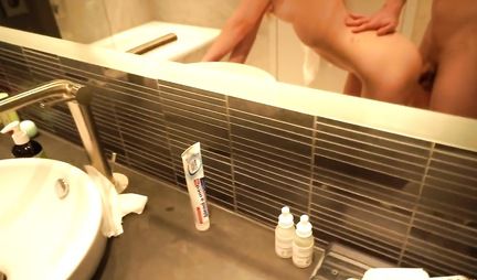 Russian chick quickly fucks with a guy in the bathroom