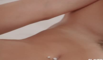 A mulatto with small tits gently caresses the pussy of a lesbian