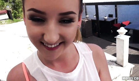 A bald man with a beard bangs gorgeous babe outdoors