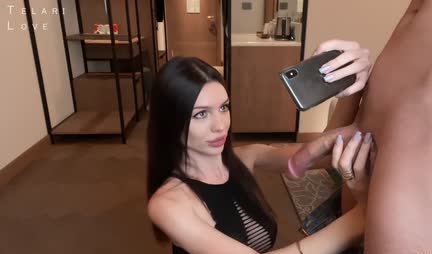 Russian beauty takes a selfie while sucking her new friend's cock