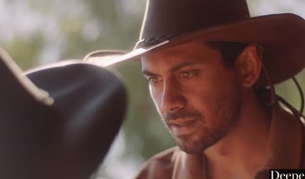 A cowboy with a big dick rides a red-haired chick to orgasm