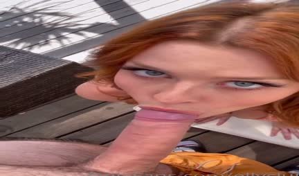 Red-haired beauty in a swimsuit is ready for sex in the fresh air