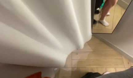 A guy fries a slender chick in the pussy in the first person in the fitting room