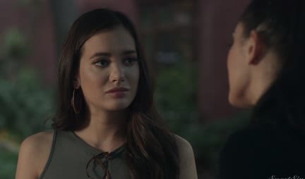 A passionate brunette in stockings deftly straddles her lover's trunk