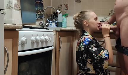 A young housewife in a robe gets up doggy style for fun