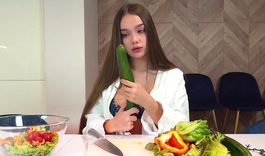 A young girl pleased her pussy with gentle masturbation