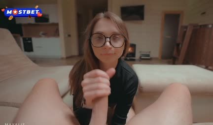 A young modest in glasses pleased with a high -quality blowjob