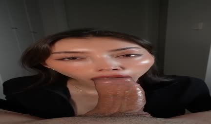 Cute Asian with pleasure sucks a big cock