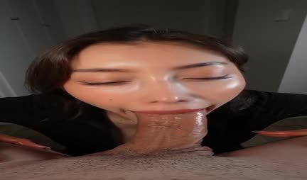 Cute Asian with pleasure sucks a big cock