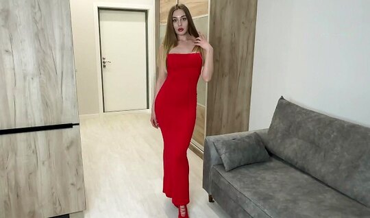 Russian girl in a red dress came to seduce a guy