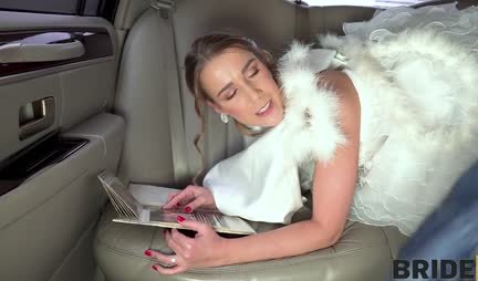 A lustful bride in a wedding dress changes in the car