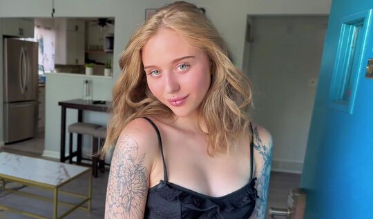 A young bitch with tattoos deftly saddled a strong cock