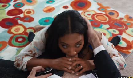 A black woman with big tits straddles her colleague's trunk