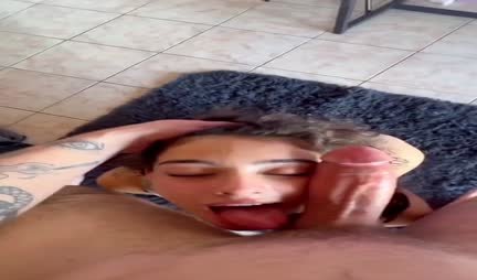 A cute girl gives a deep and juicy blowjob to a guy